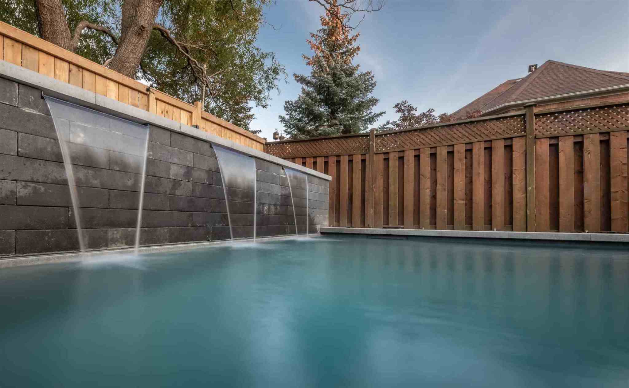 Swimming pool waterfalls installation